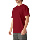 Burgundy short-sleeve t-shirt with chest pocket and small logo detail, worn with gray cargo pants.
