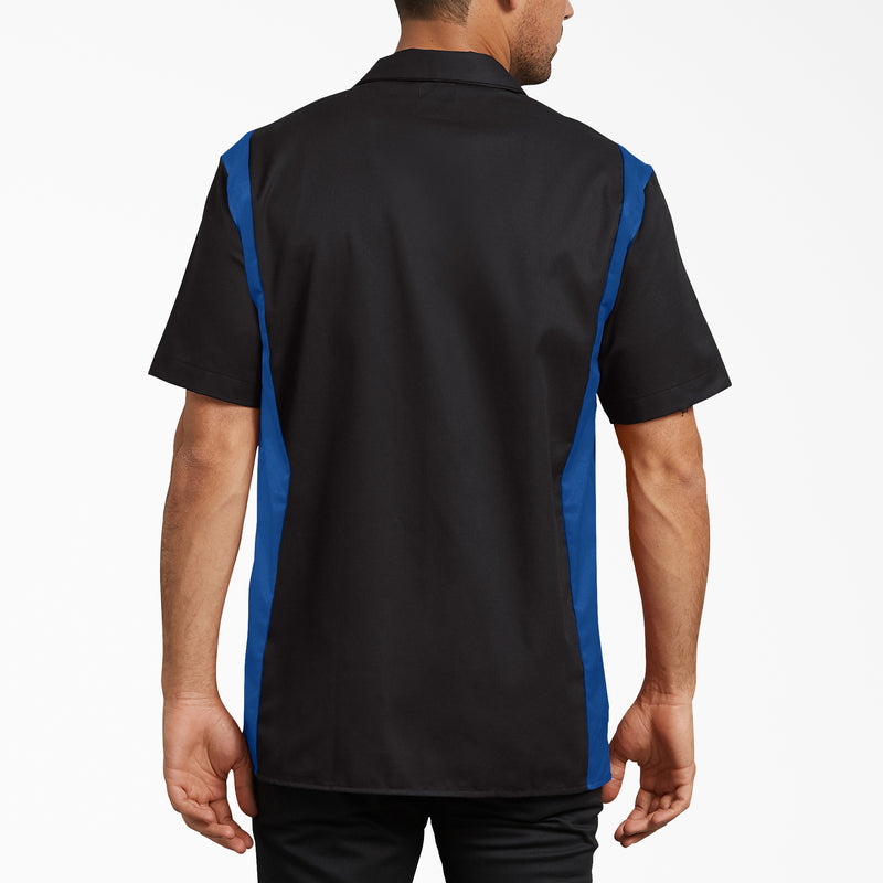 Black and blue short sleeve work shirt with color-blocked sides, shown from back view on male model.