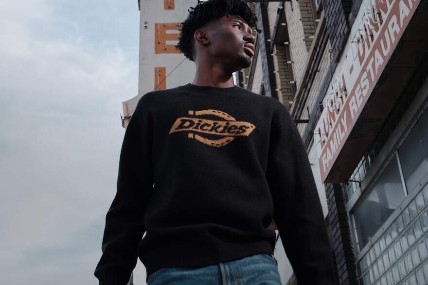 Man wearing Dickies logo sweatshirt
