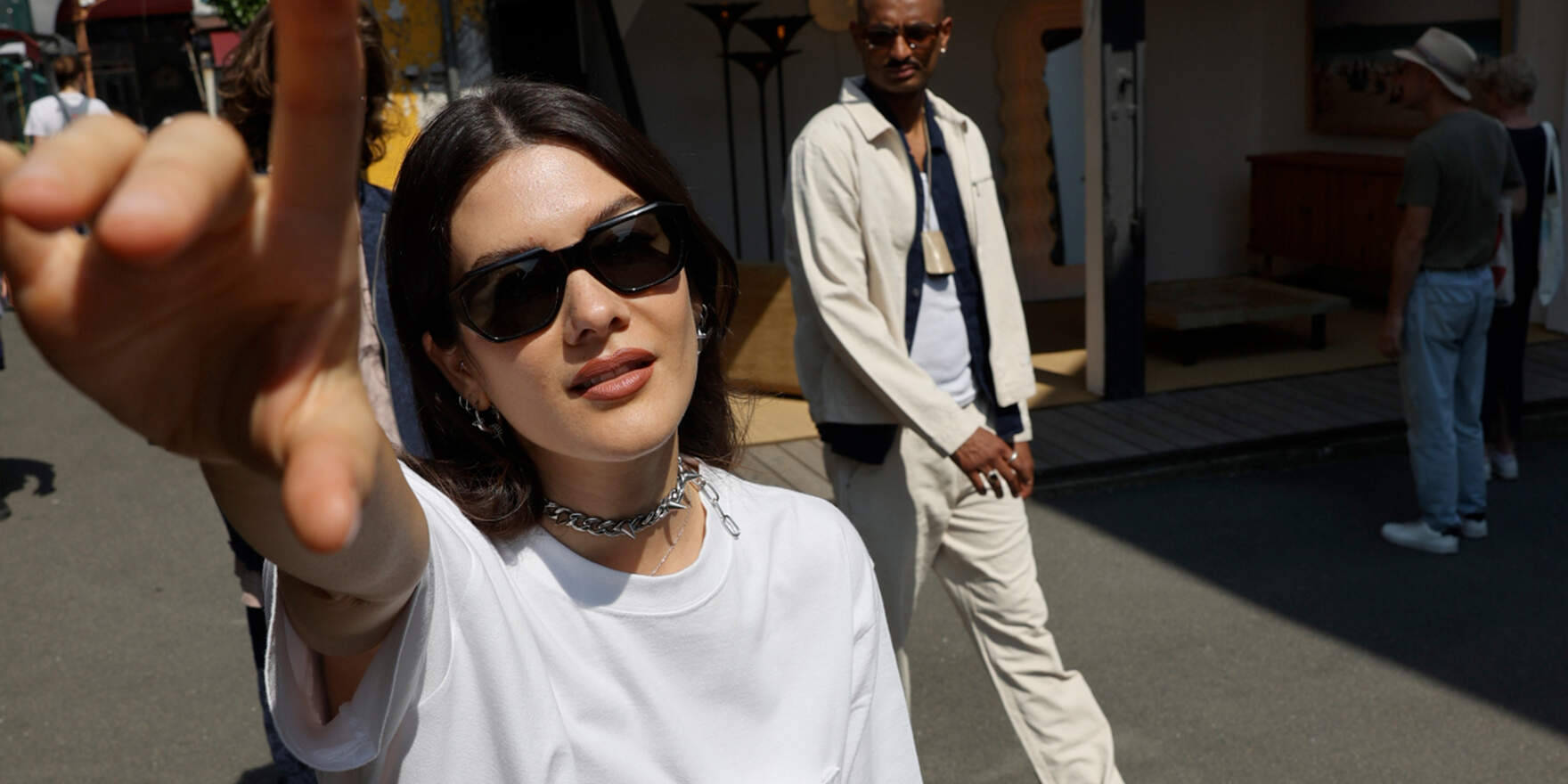 Woman in sunglasses wearing Dickies Premium Tee Shirt in White