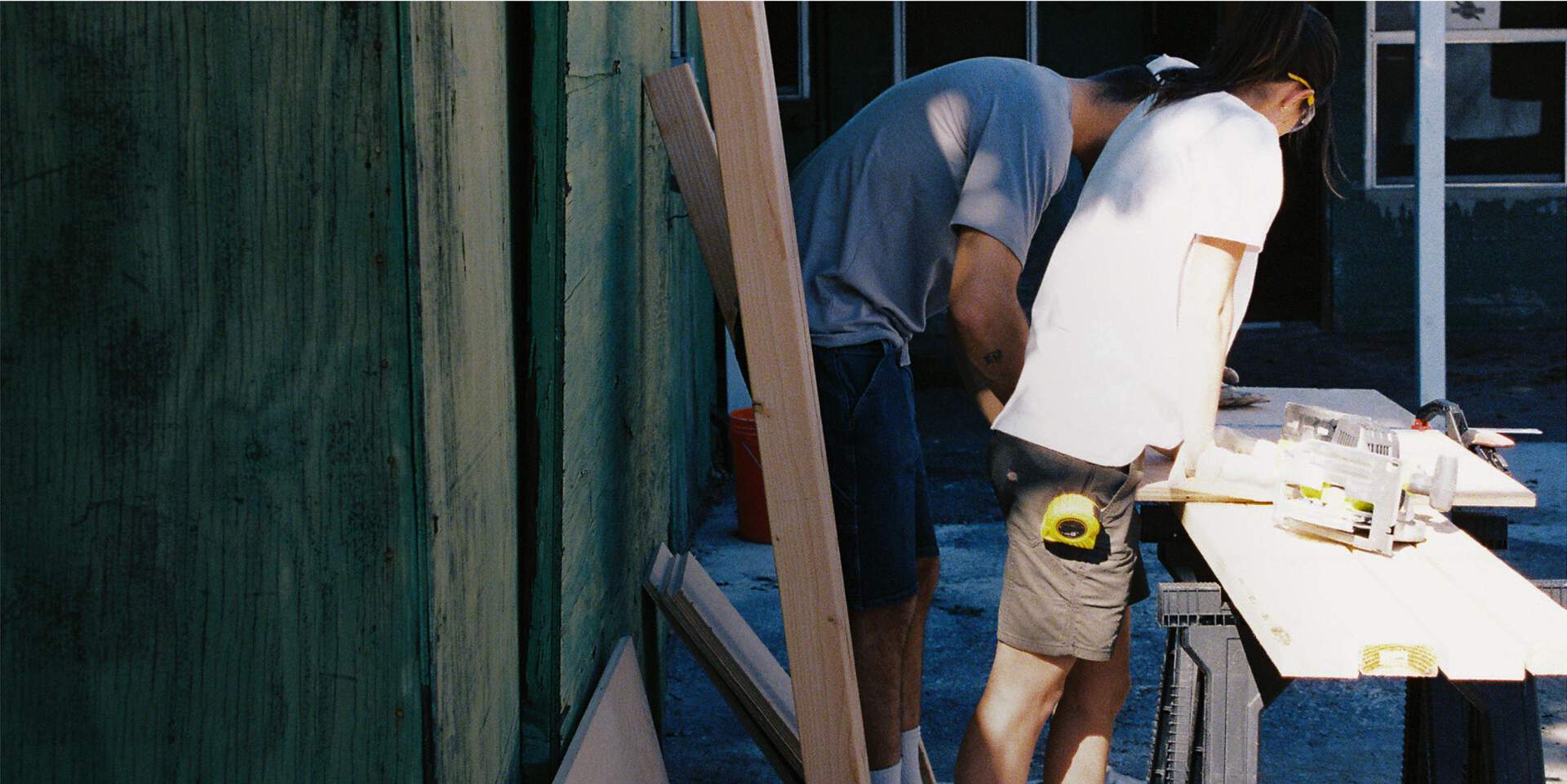 Two men working wearing Dickies shorts