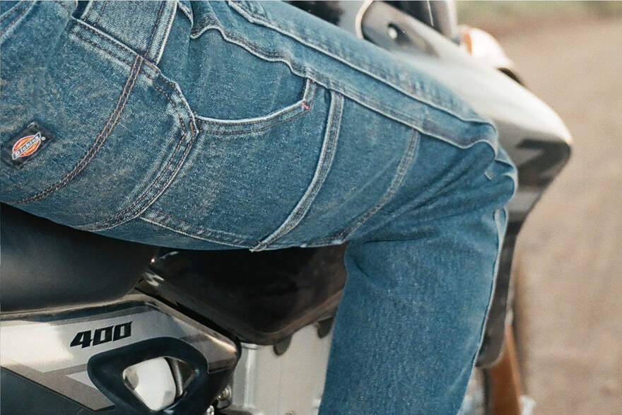 Close up of side pockets on womens denim jean pants