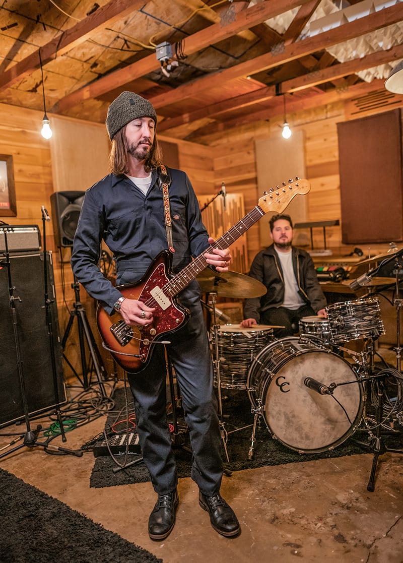 A look at Joey wearing the Iconic Coverall in the studio.