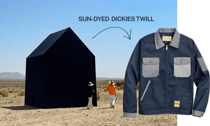 A black out shed in the desert background with a laydown sun dyed twill jacket in the foreground