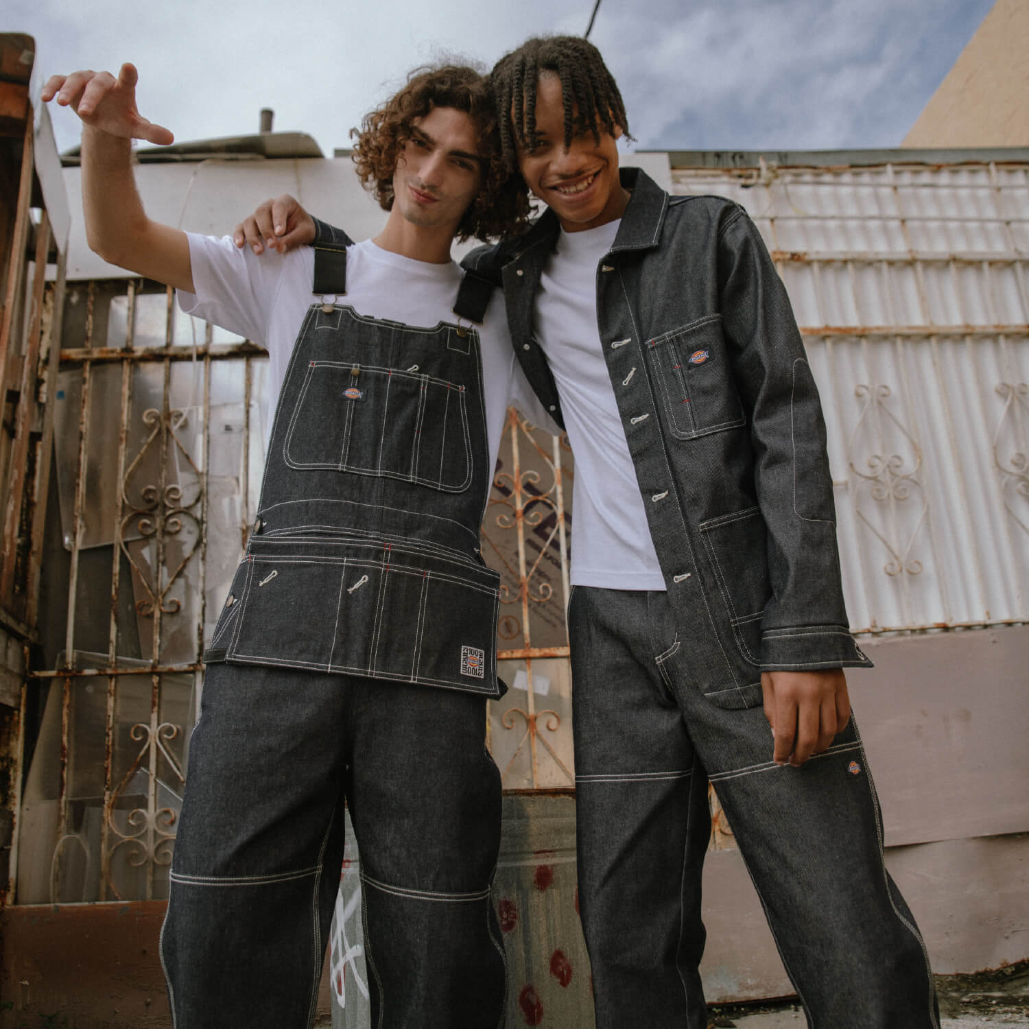 Two men wearing dickies one hundred year denim outfits