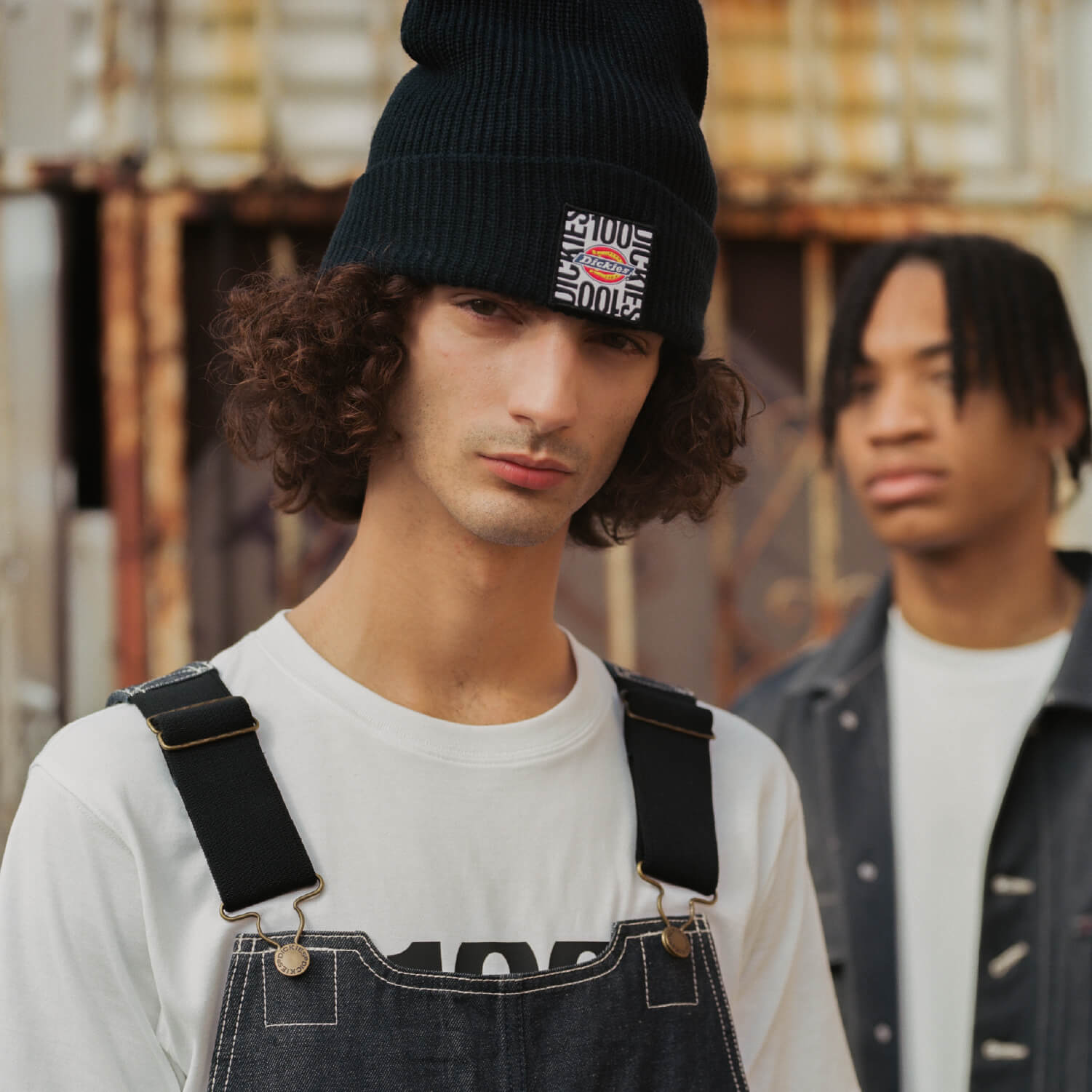 dickies iconography of one hundred years and a male wearing a beanie with the one hundred years dickies icon