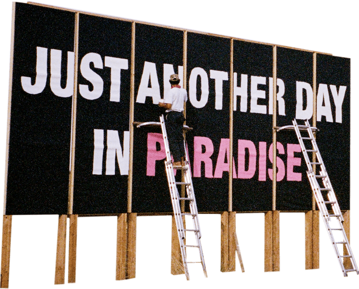 a billboard with the words just another day in paradise