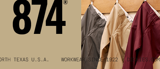 several dickies work shirts hanging on a wall