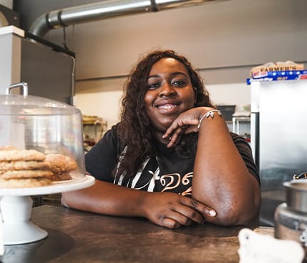 Chef tareka smiling at the camera