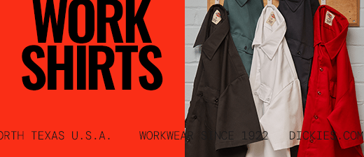 several dickies work shirts hanging on a wall