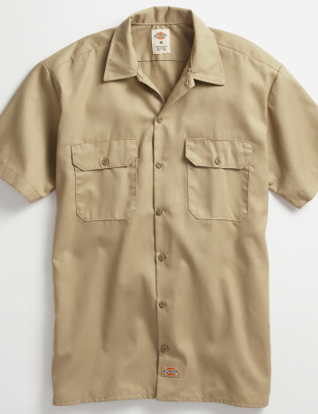 a laydown of dickies short sleeve button up work shirt in khaki