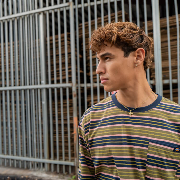 Close of up dickies striped clothing and matching uniform sets on the right